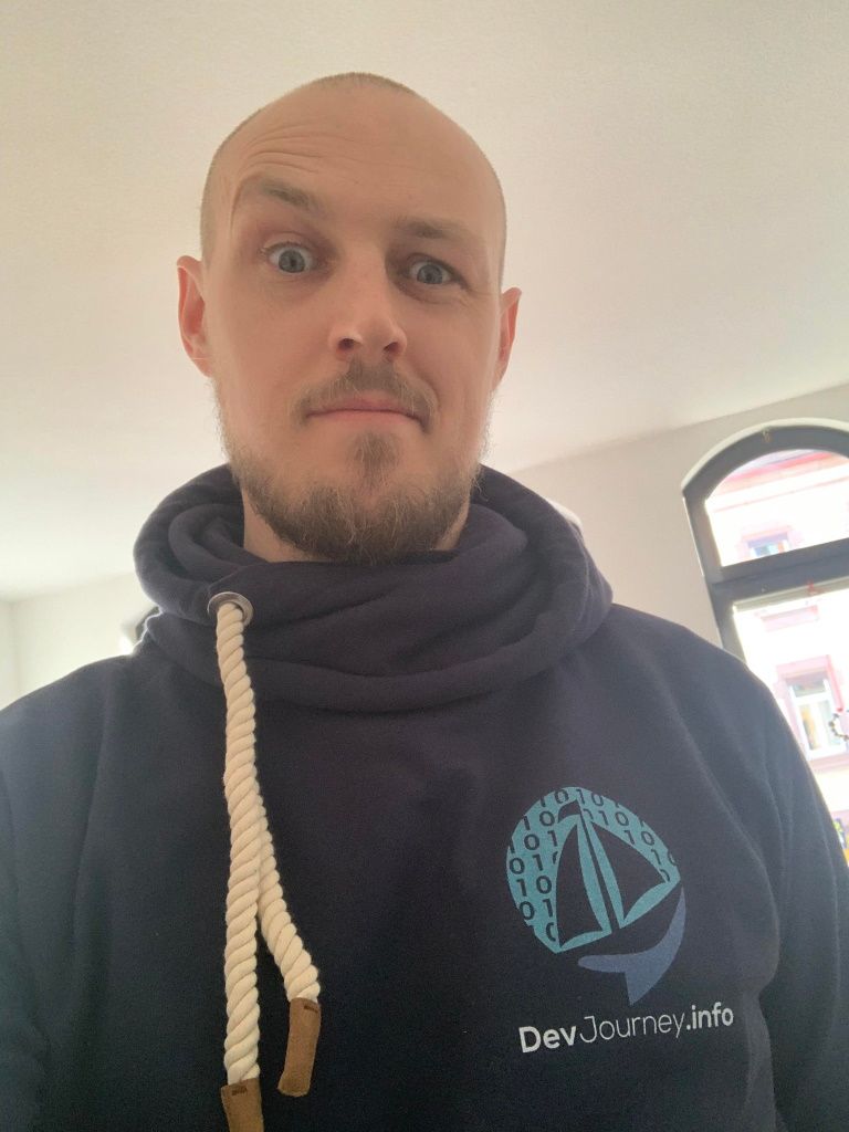 Tim with a DevJourney Sweatshirt